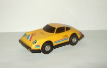 Игрушка автомобиль Порше Porsche 911. Желтый цвет. Cделано в СССР. 1980-е гг. 1:40
